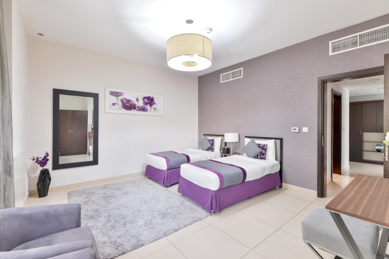Nassima Tower Hotel Apartments Dubai Exterior photo A bedroom in a typical apartment