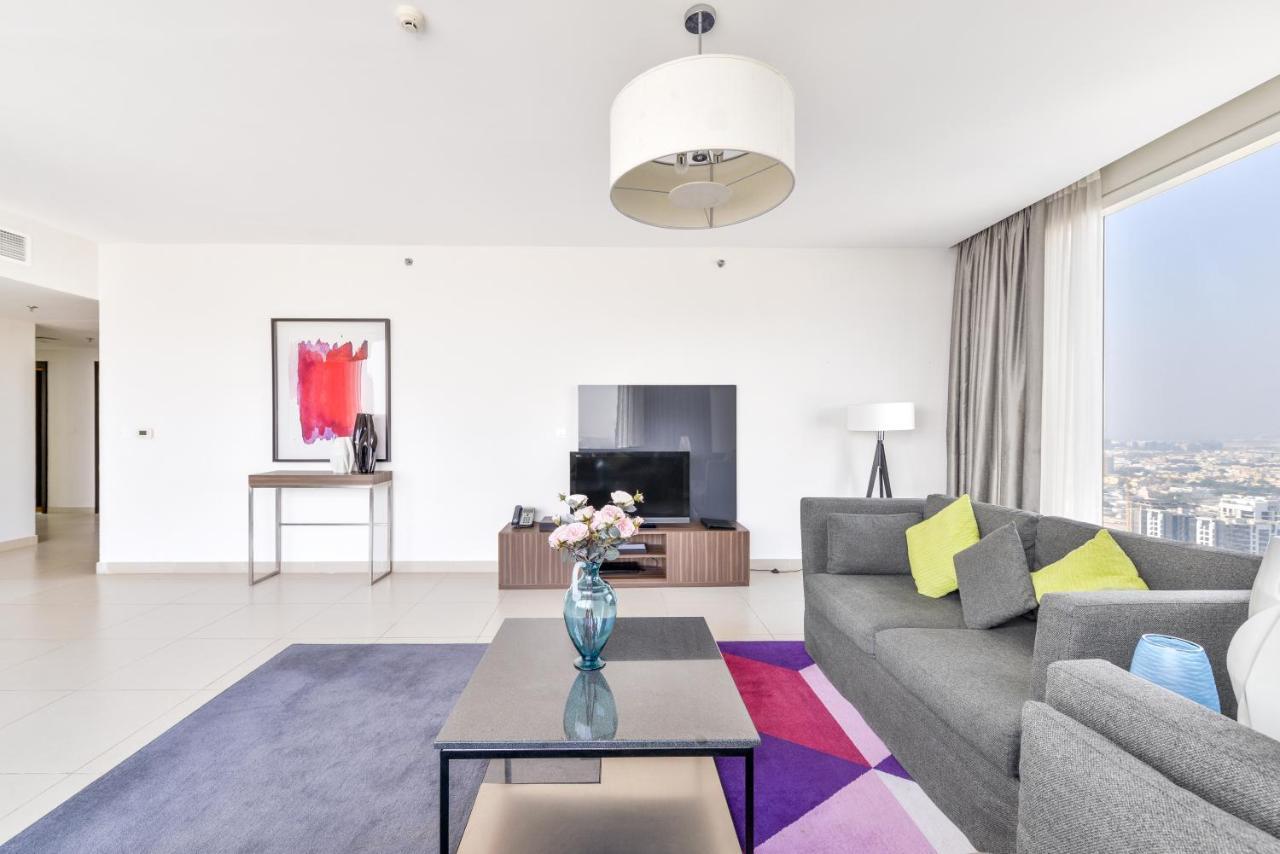 Nassima Tower Hotel Apartments Dubai Exterior photo A living room in a serviced apartment in Dubai