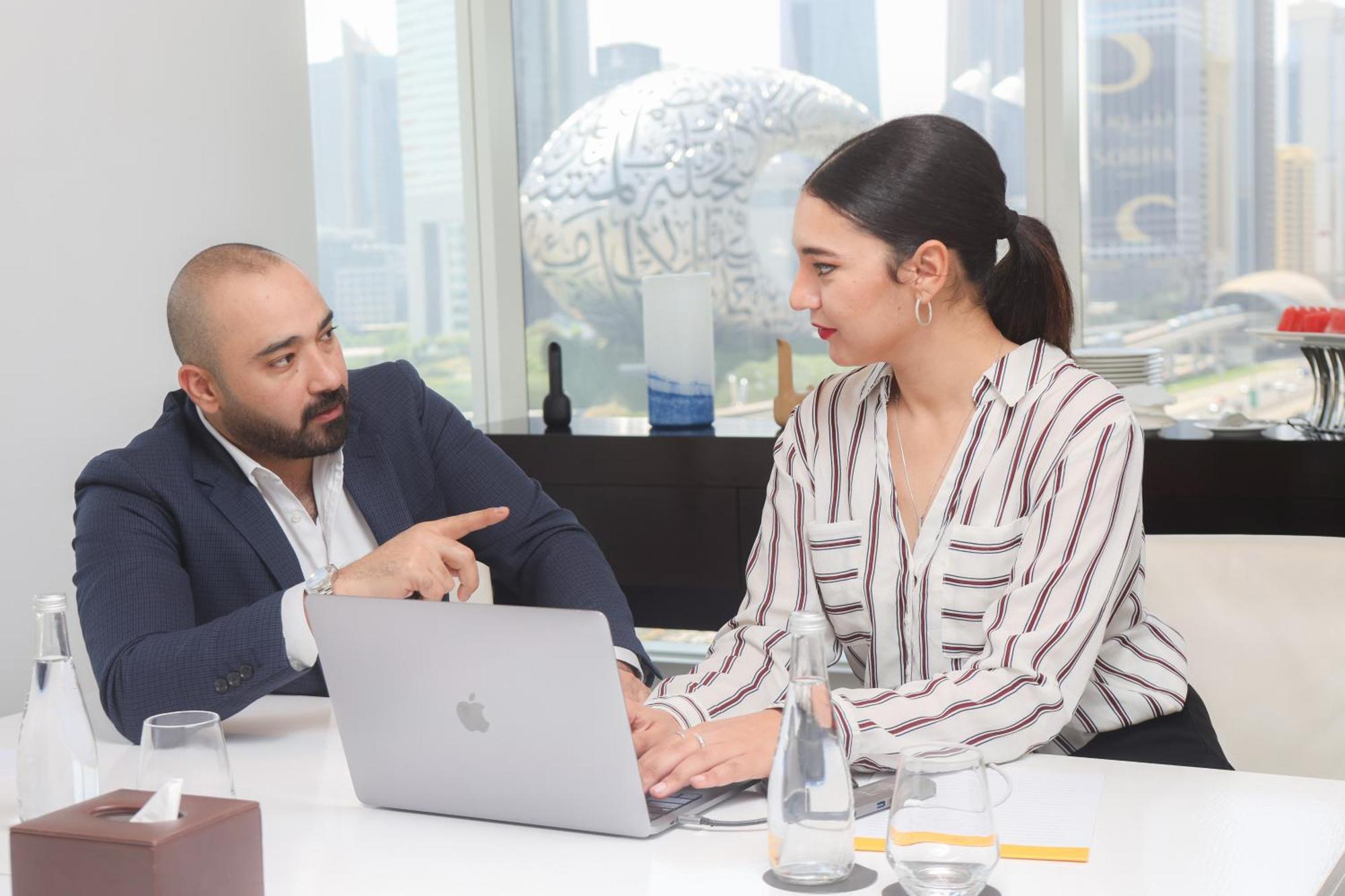 Nassima Tower Hotel Apartments Dubai Exterior photo A meeting between a financial advisor and a client