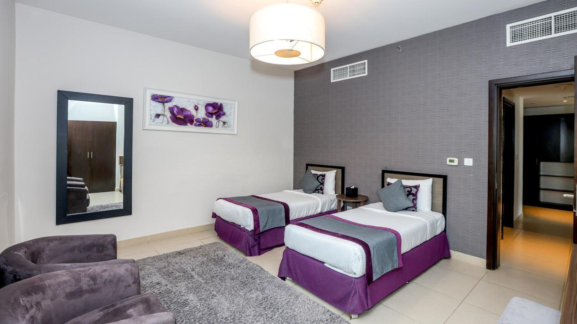 Nassima Tower Hotel Apartments Dubai Exterior photo A bedroom with two single beds